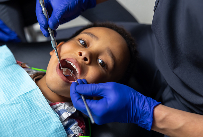 bambino dal dentista